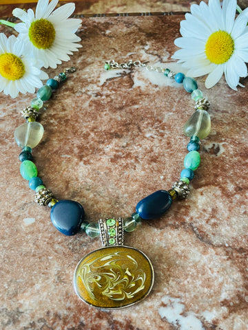 A Mix of Beads & Shades of Green Pendant Necklace