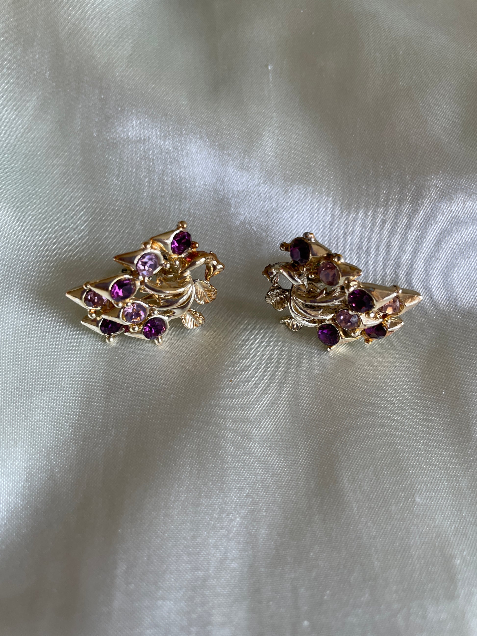 1950s Coro clip earrings  50s Signed Coro Gold Tone Purple  Glass Detail Clip Earrings