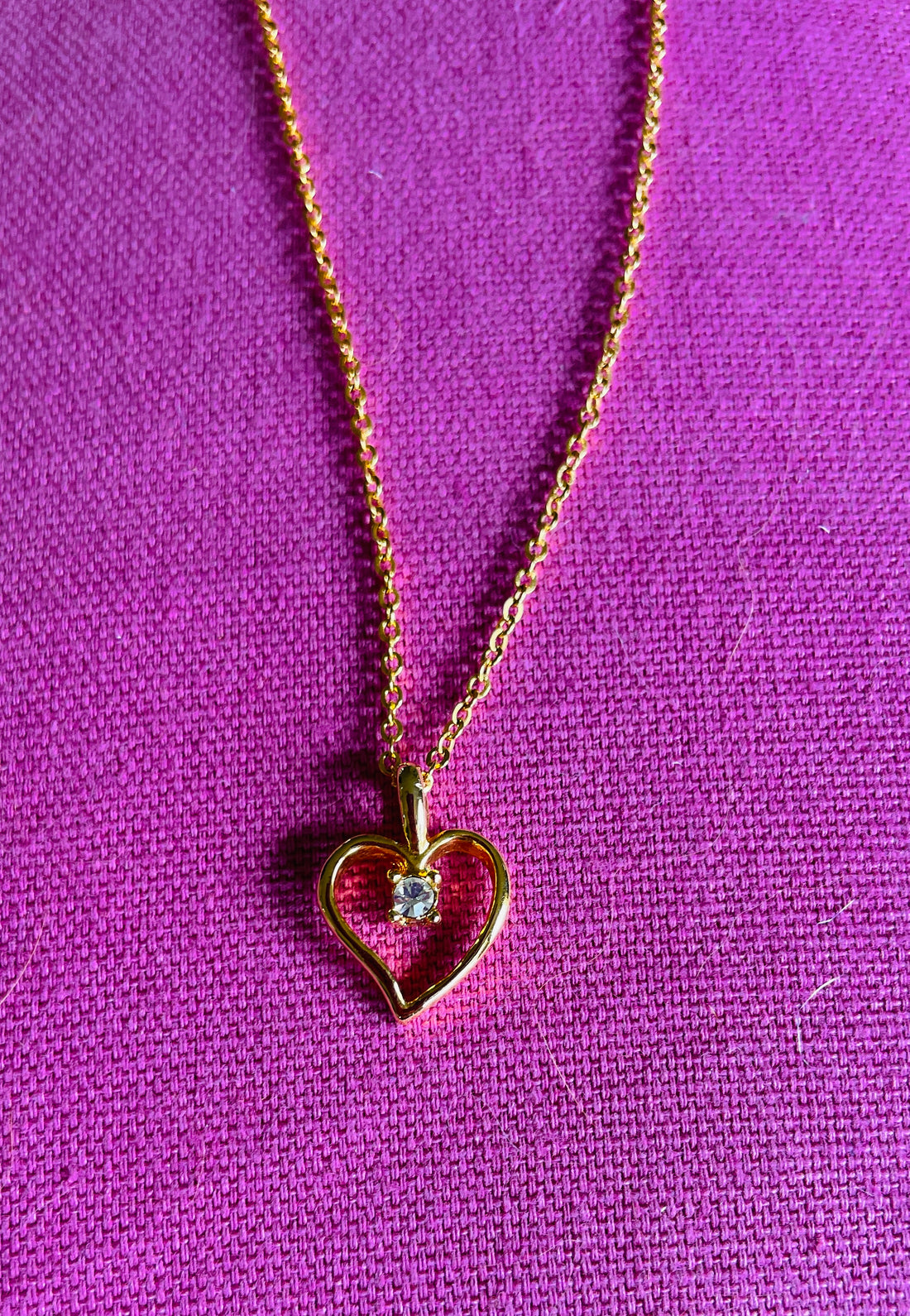 2000s Gold Tone Chain Tiny Open Heart Crystal Accent Pendant Necklace.