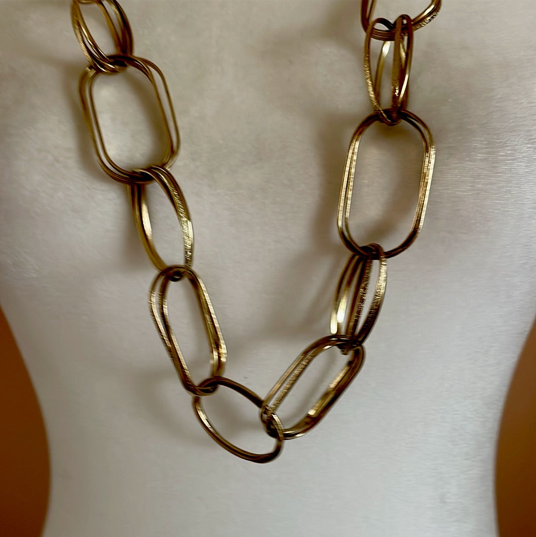 Stylish triple link gold tone necklace